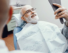 dental professional explaining dental insurance to patient