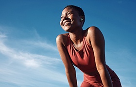 Lady smiles outdoors